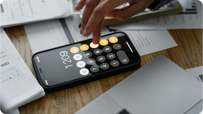 picture of a person using a calculator
