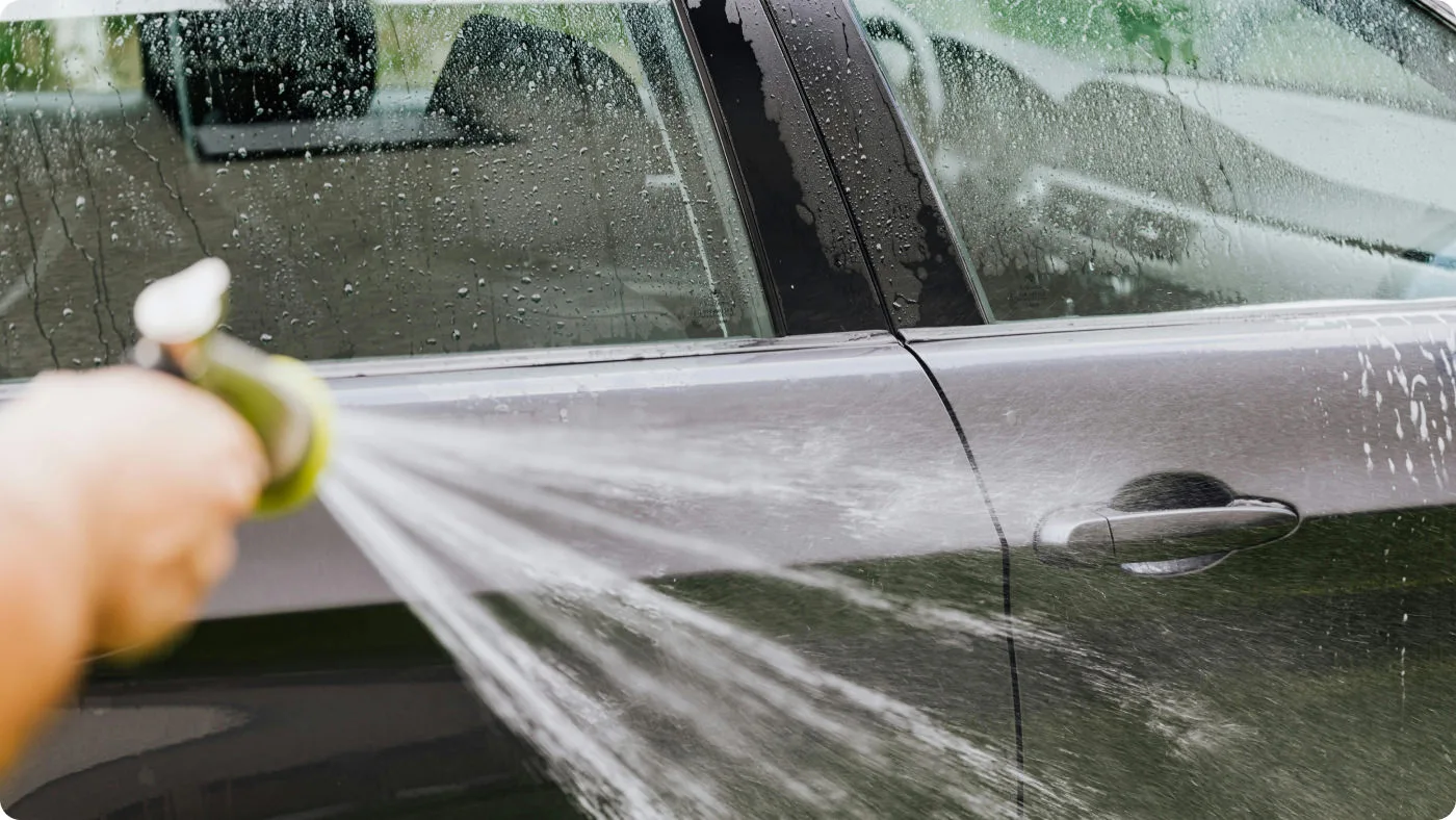 picture of a person washing a car